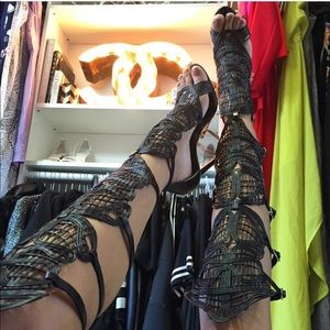 Black thigh high gladiator sandals that convert to regular ankle height